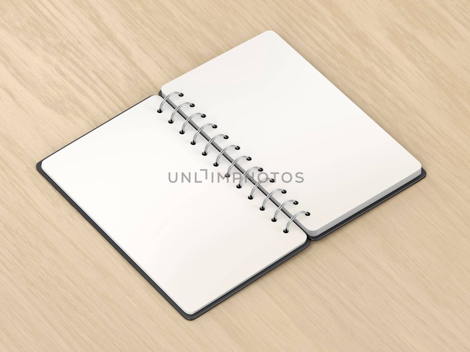 Opened notebook on wooden desk