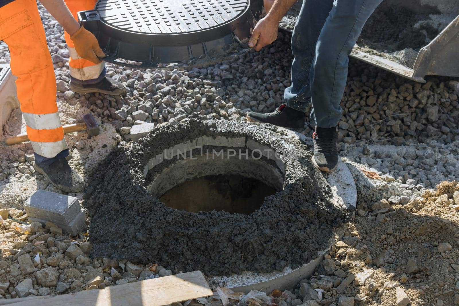 Construction of sewerage installing a sewer manhole on septic tank by ungvar