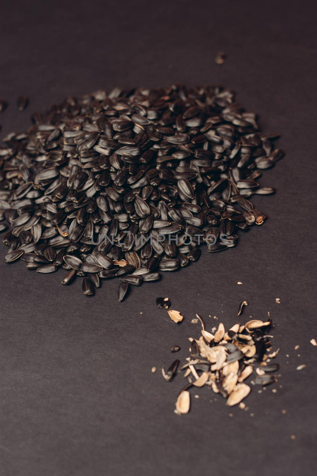 natural product sunflower seeds handing close-up food. High quality photo