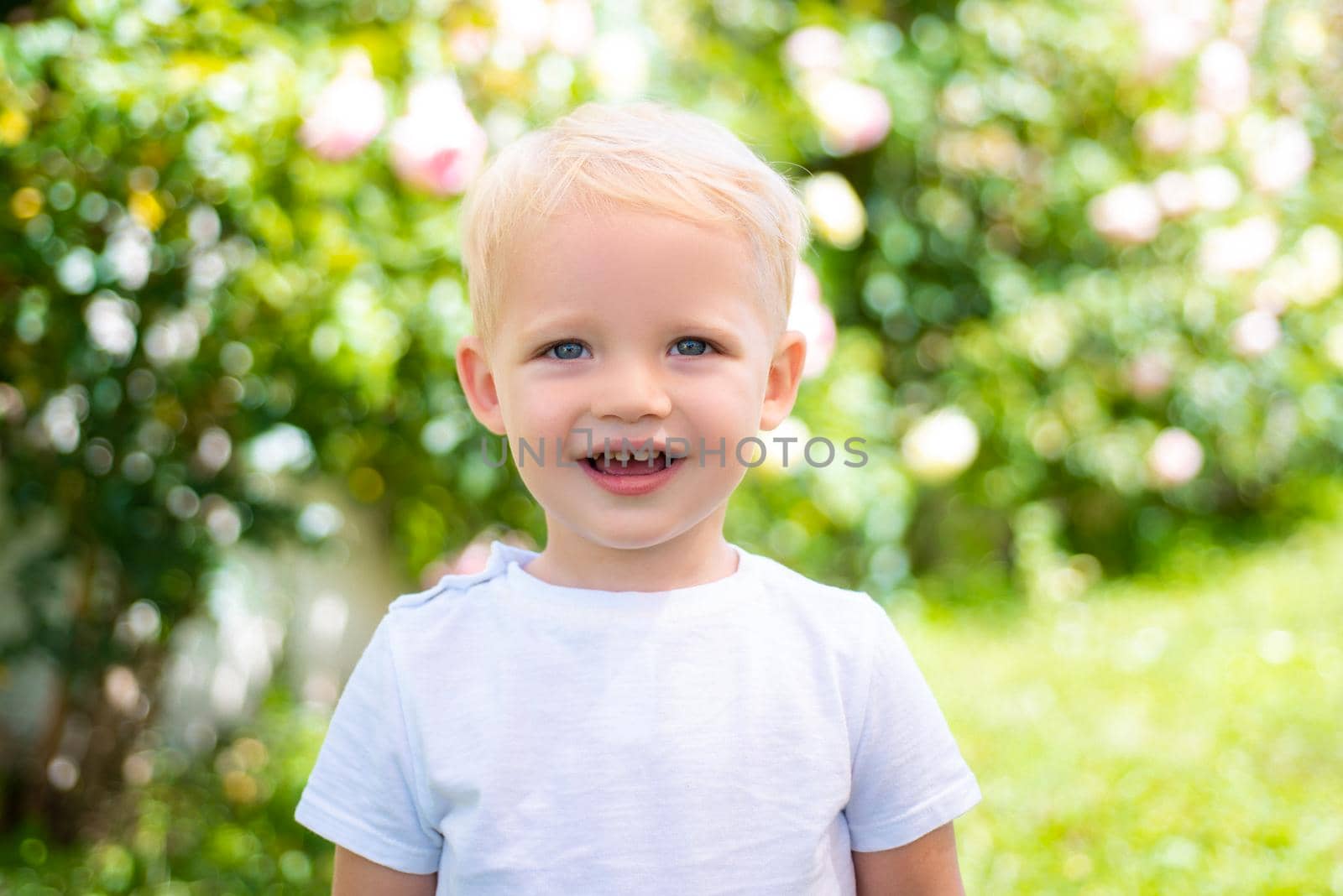 Boy cute playful cheerful child funny grimace face. Has happy. Happy day