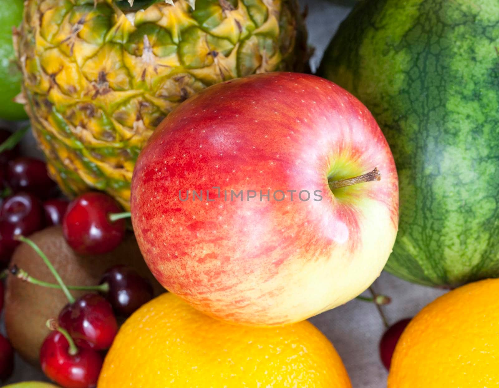 pineapple, apples, oranges and other fruits and berries closeup, photo of natural food