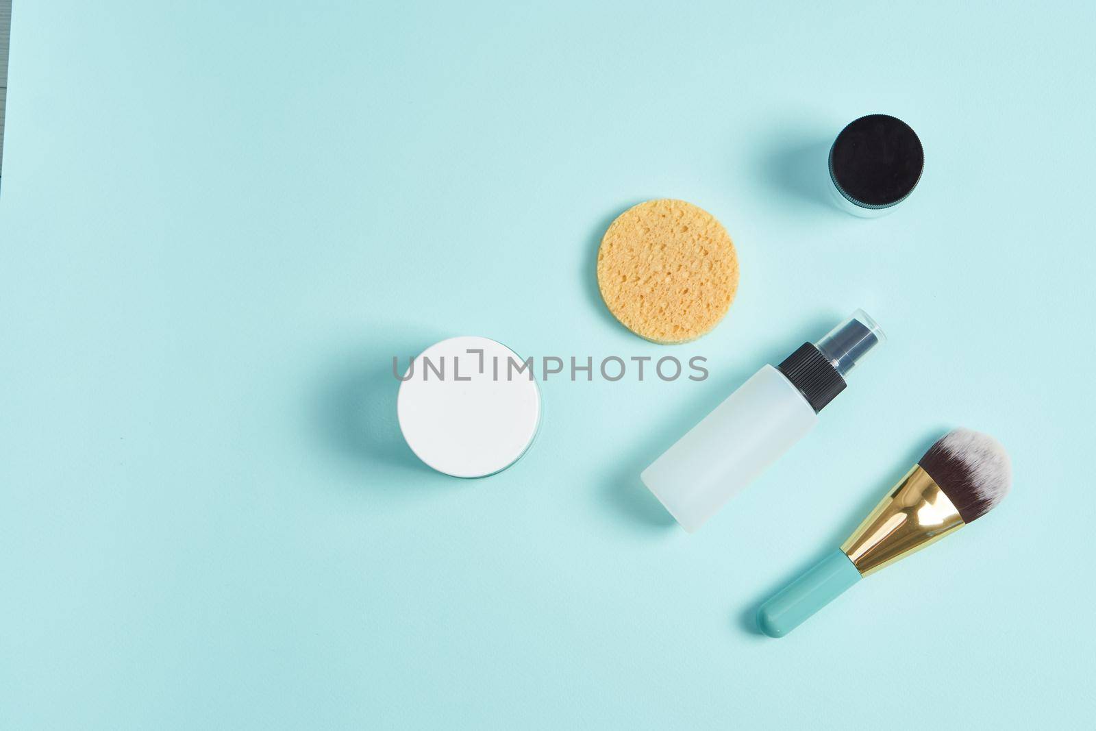bathroom accessories cosmetics health procedures blue background. High quality photo