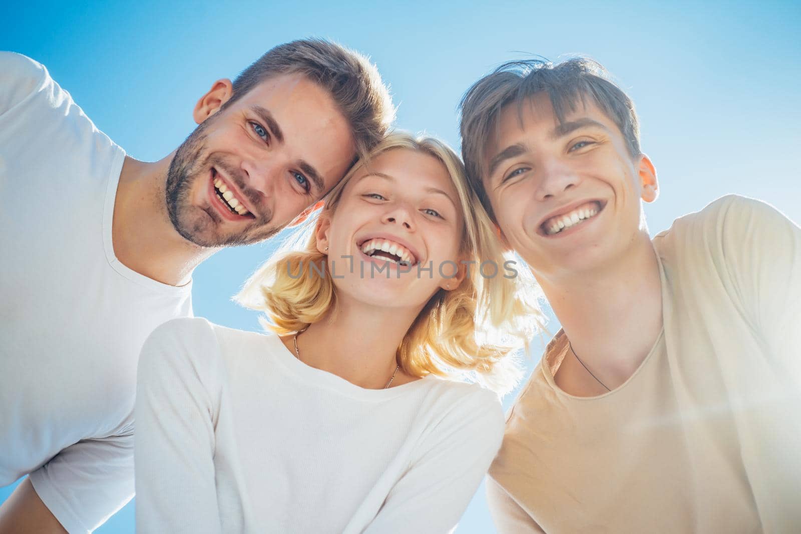 Happy group young people. Cheerful smiling happy best friends walking outdoor together and having great time. Sweet memories about summer holidays. Leisure activity and friendship concept