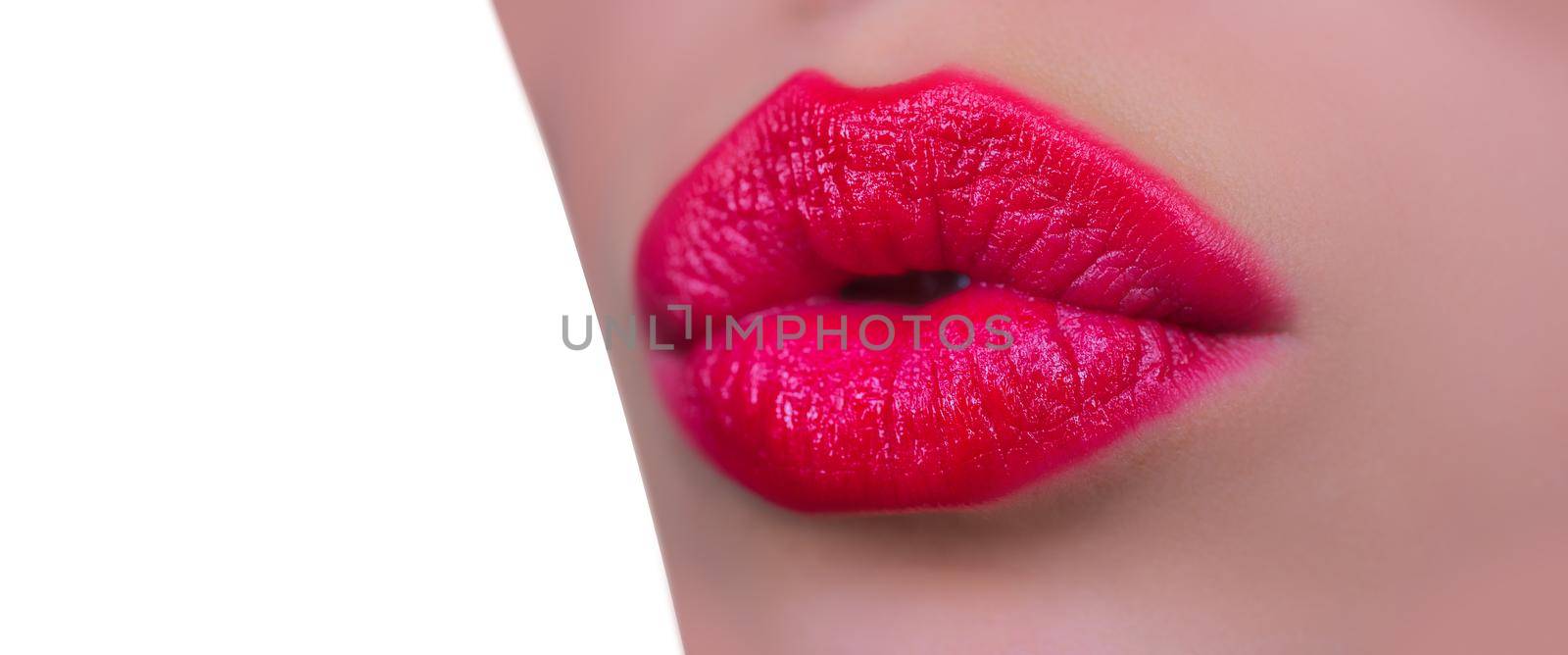 Young woman with perfect skin. Red lipstick. Isolated on white. Sensual model girl with smooth skin and makeup. Kiss. Valentines day. by Tverdokhlib