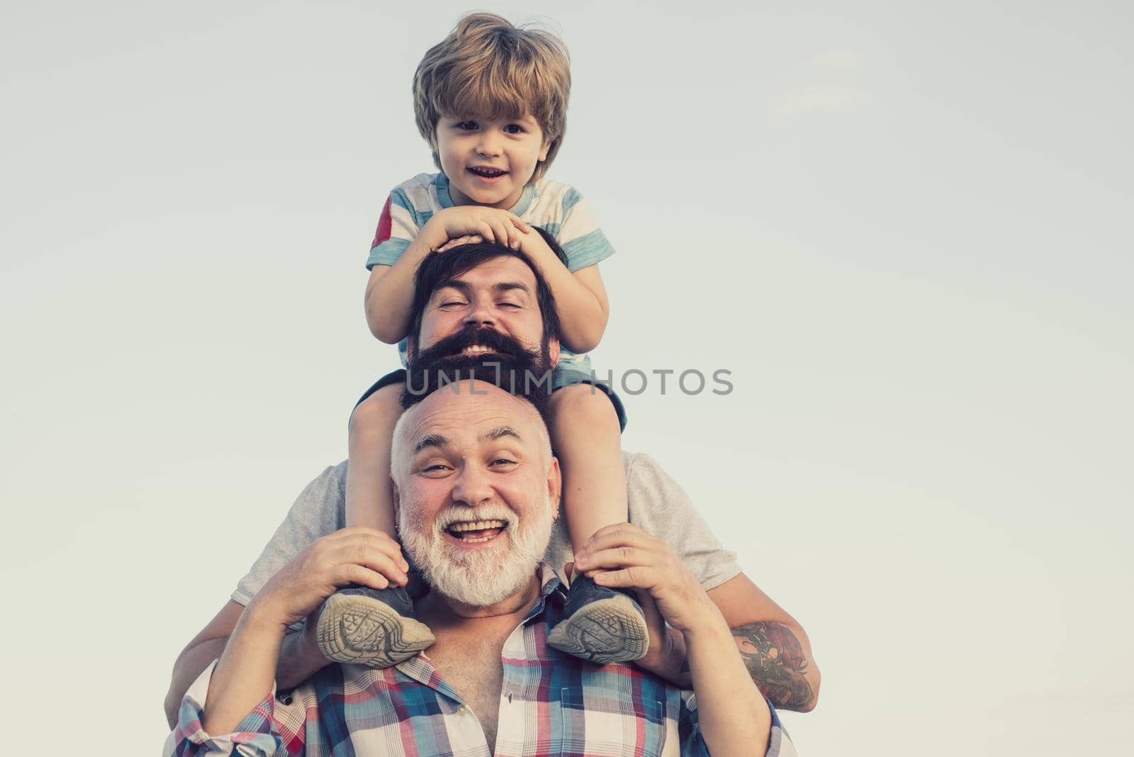 Father and son with grandfather - Men generation. by Tverdokhlib