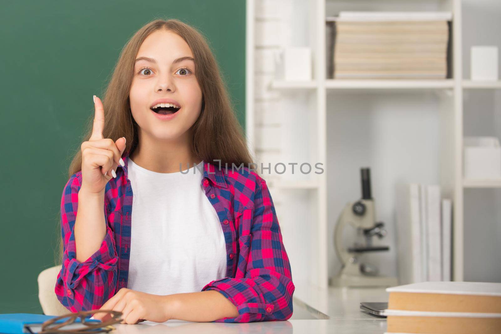 inspired kid in classroom on blackboard background. september 1. childhood. child ready to study. great idea. teen girl back to school. knowledge day. education concept.