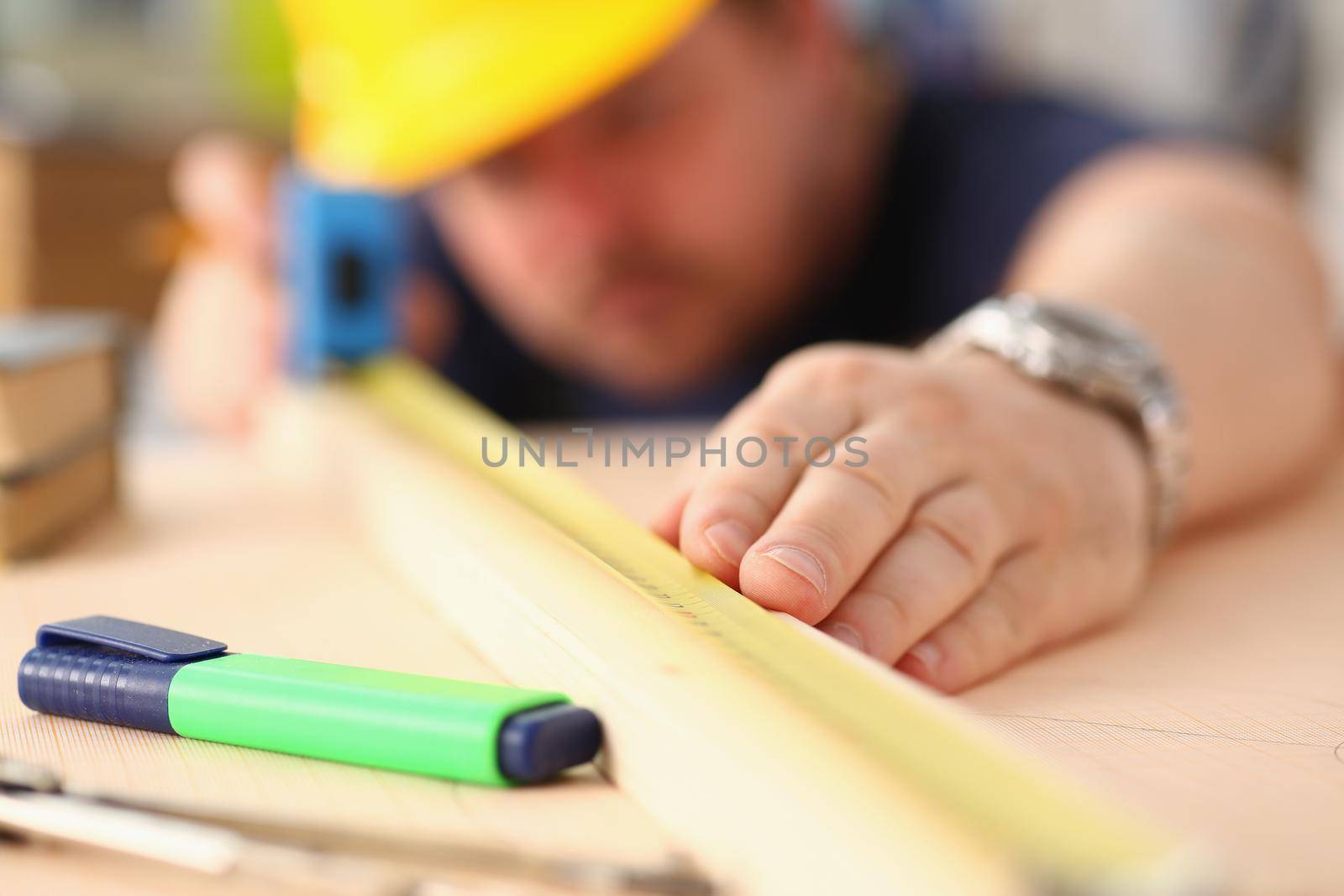 Arms of worker measuring wooden bar closeup. Manual job DIY inspiration improvement job fix shop graphic joinery startup workplace idea designer career ruler industrial education concept