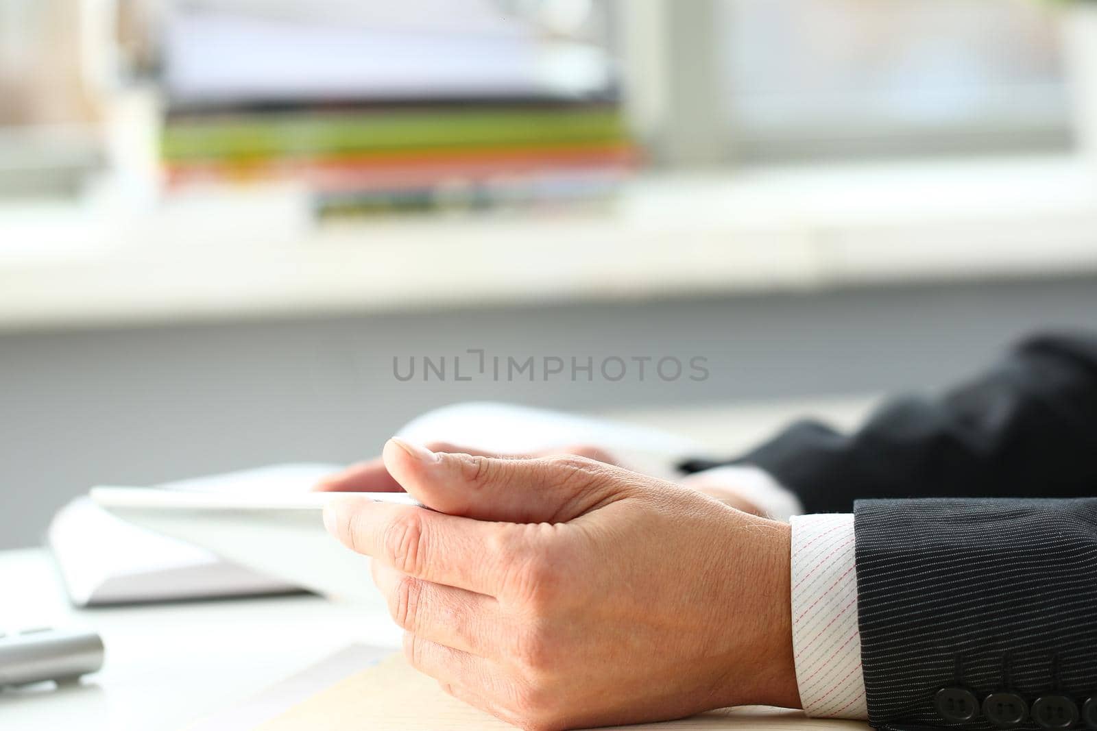 One businessman are looking and studying statistics on tablet display closeup. Male hand opponent holds pen and points out problem collaboration business coach cooperation partnership palm concept