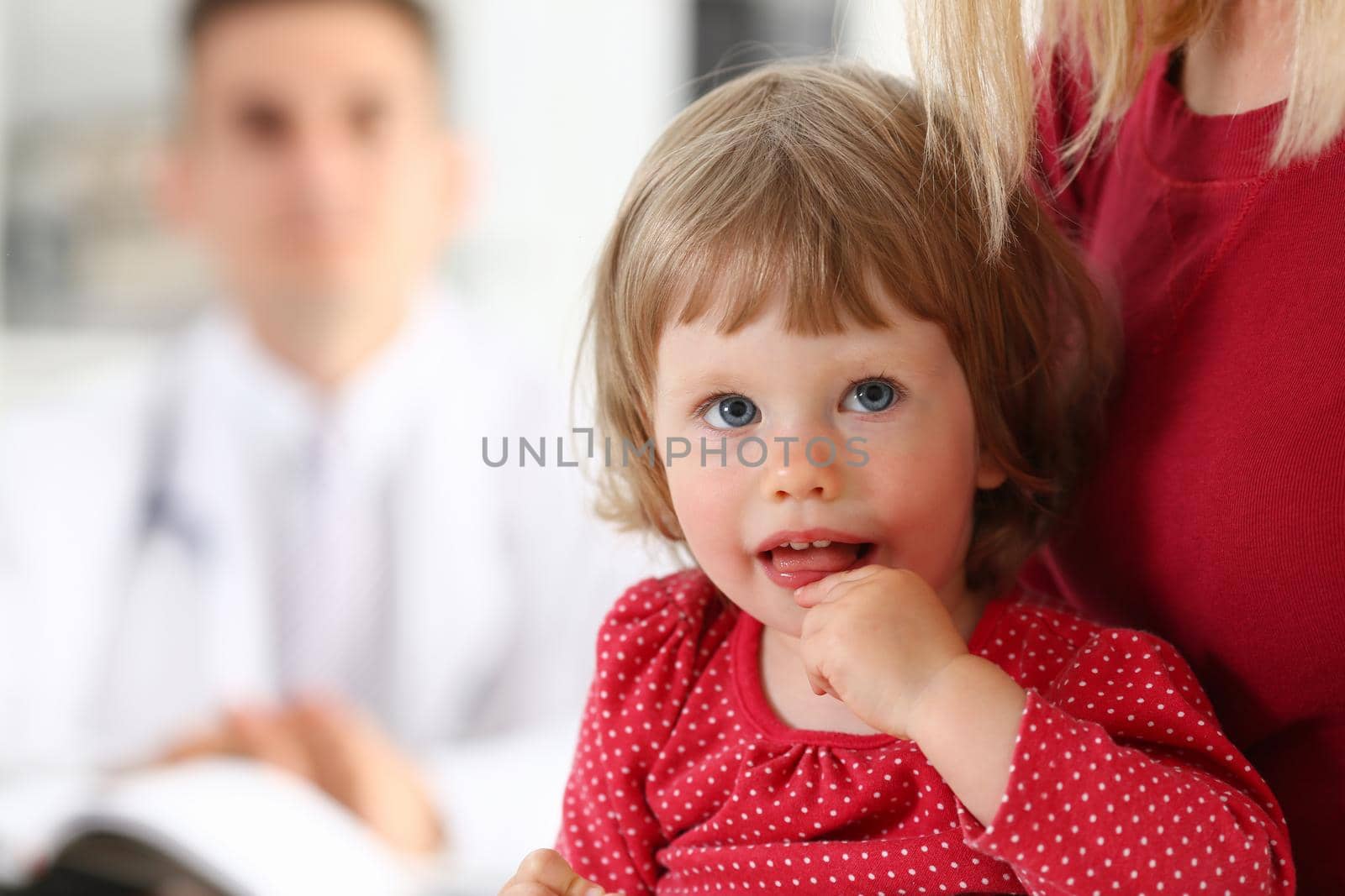 Little child with mother at pediatrician reception. Physical exam, cute infant portrait, baby aid, healthy lifestyle, ward round, child sickness, clinic test, high quality and trust concept