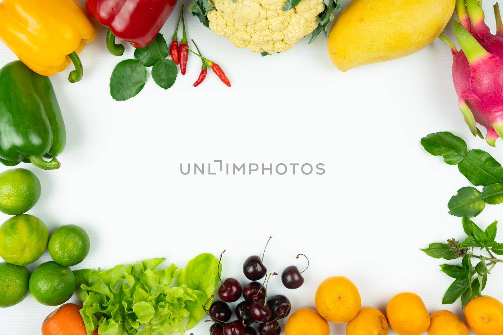 Fresh fruit and vegetable. Frame of fresh raw organic vegetables on white background by psodaz