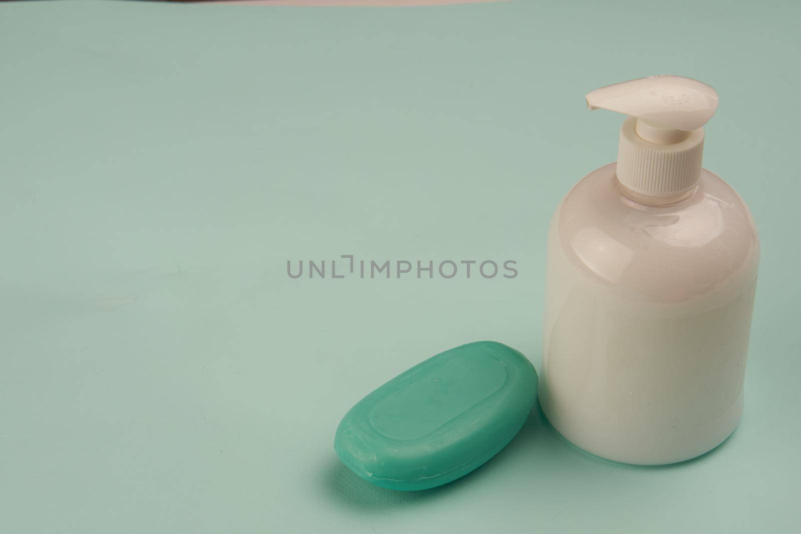 soap hygiene body care bathroom supplies green background by Vichizh