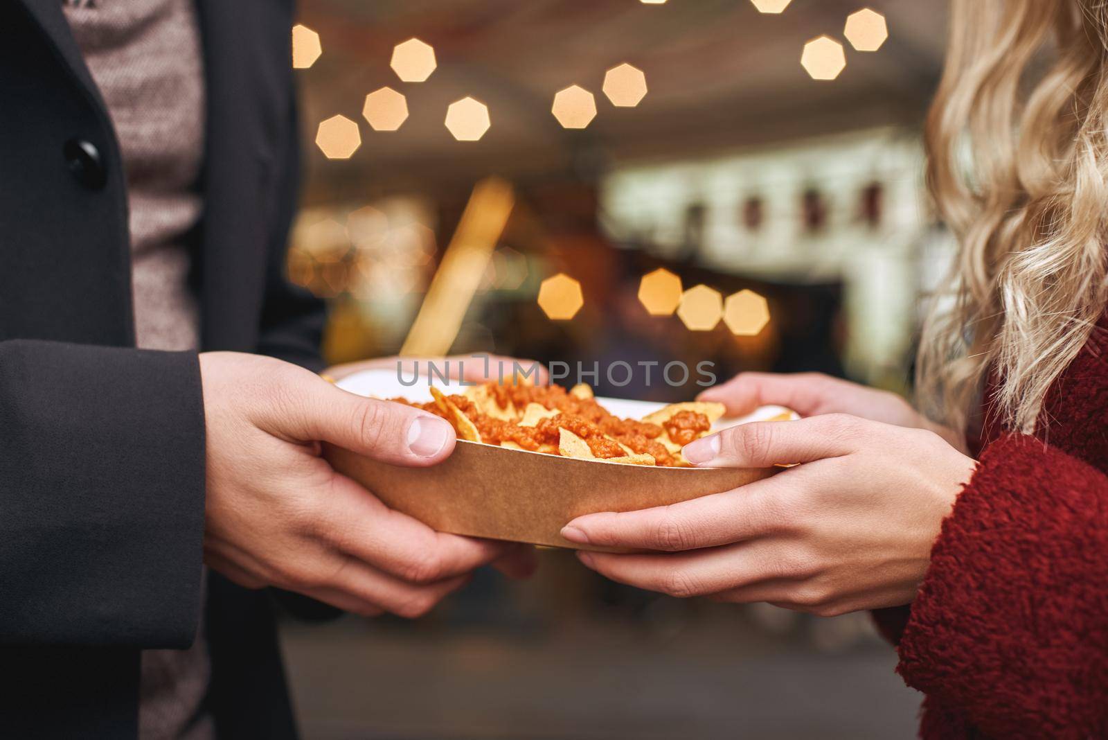 Couple eating mexican food. The concept of Mexican cuisine. by friendsstock