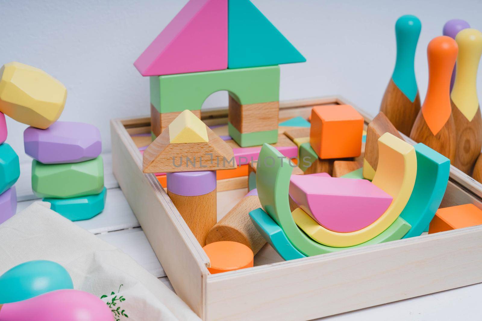 Wooden constructor for children. Colorful toys made of natural materials. Zero waste. Developing game.