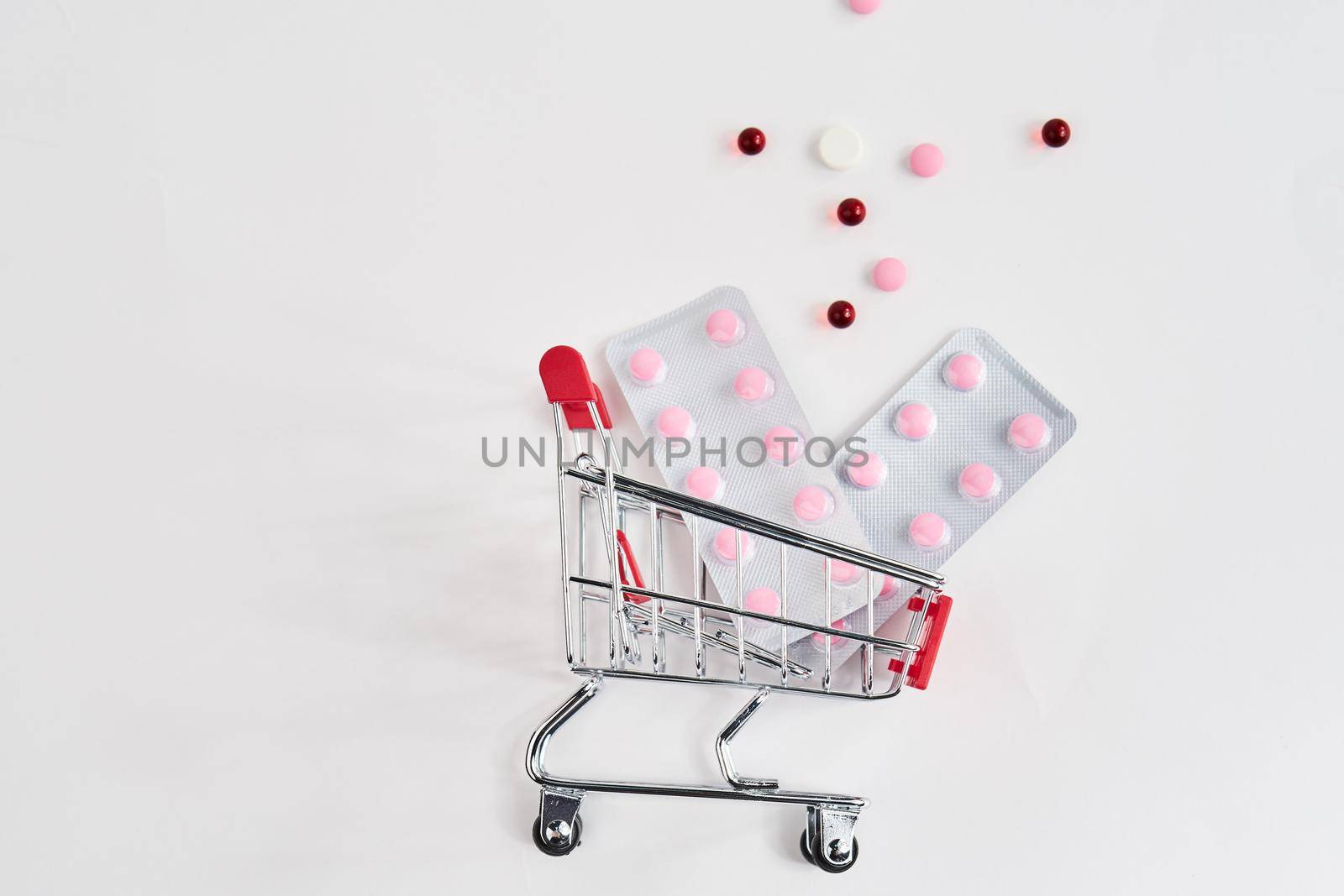 drug trolleys pharmacy shopping light background pharmacy. High quality photo