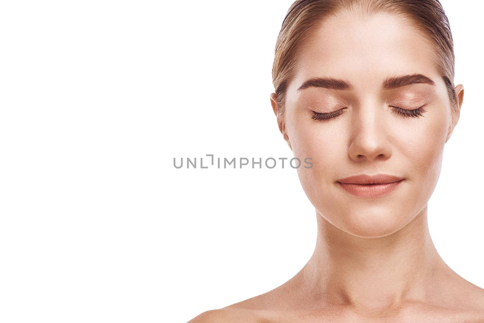 Beautiful woman face close up studio photo on white background. Light hair, grey eyes, closed eyes