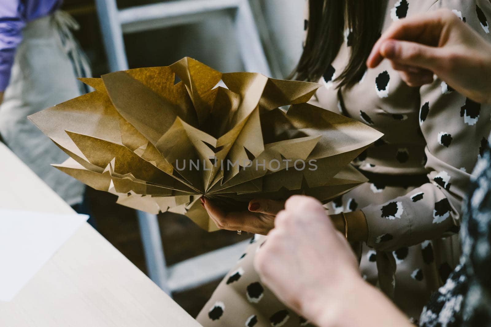 Creating hand made christmas ornaments. The origami stage. by Rodnova