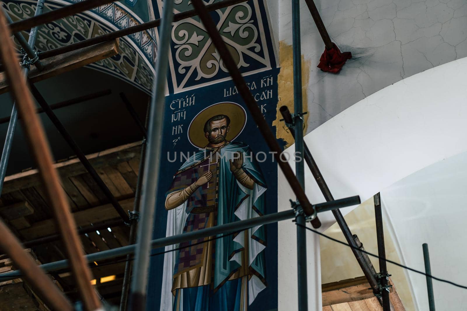 Close up of icon in church under renovation. by epidemiks