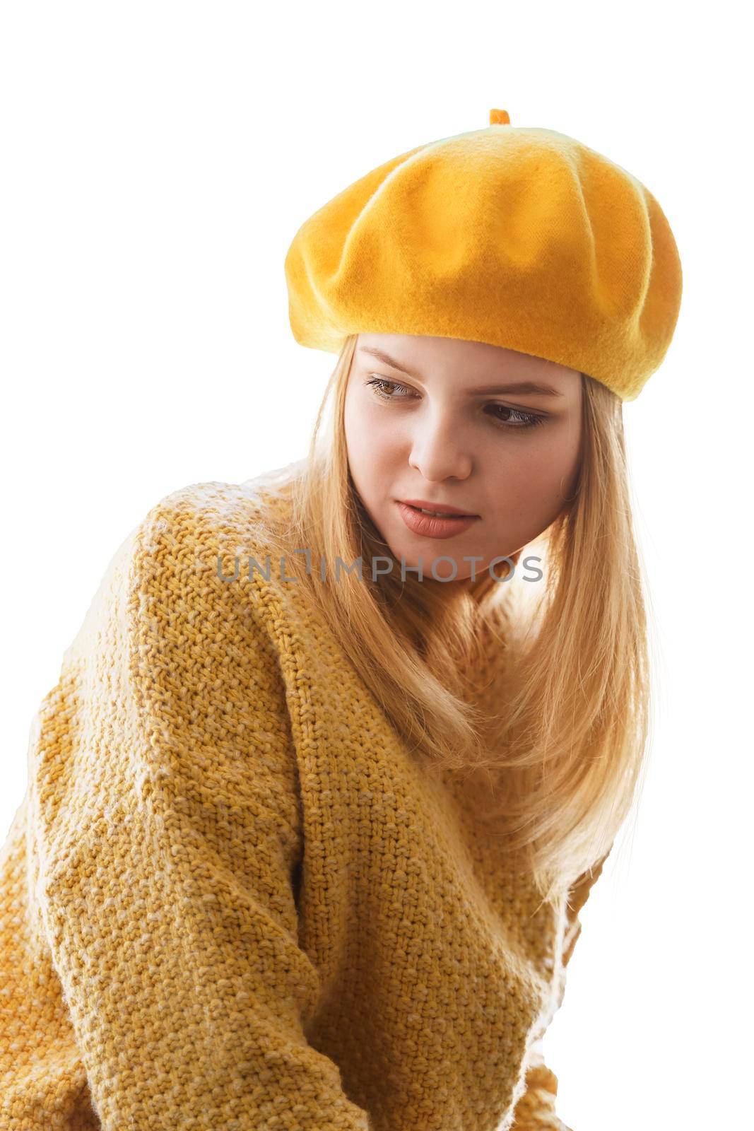 portrait of a young woman in a yellow beret, isolate on a white background