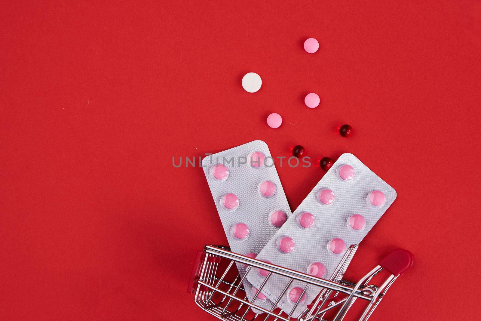 small trolley with medicines pharmacy shop pills shopping by Vichizh