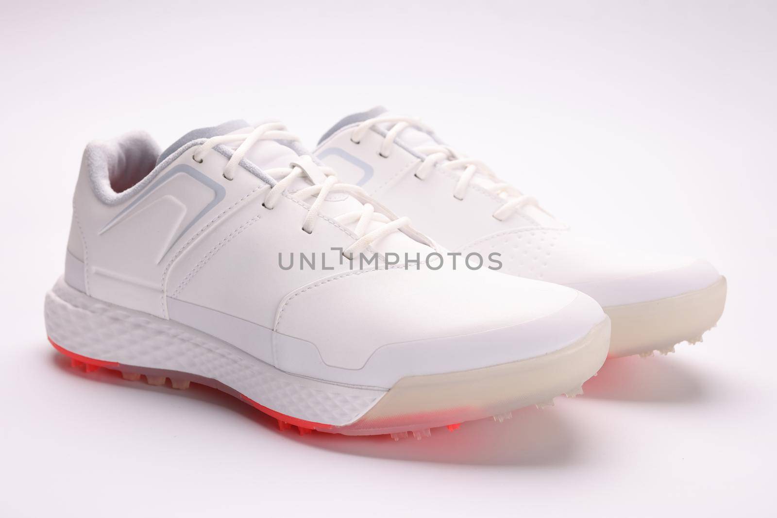 Fashionable women's white sneakers with laces on a paper sheet by kuprevich