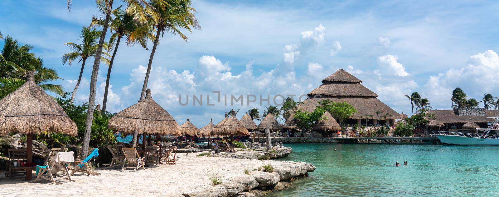 Cancun, Mexico - September 13, 2021: Lagoon at XCaret park on Mayan Riviera resort. XCaret is a famous ecotourism park on the mexican Mayan Riviera