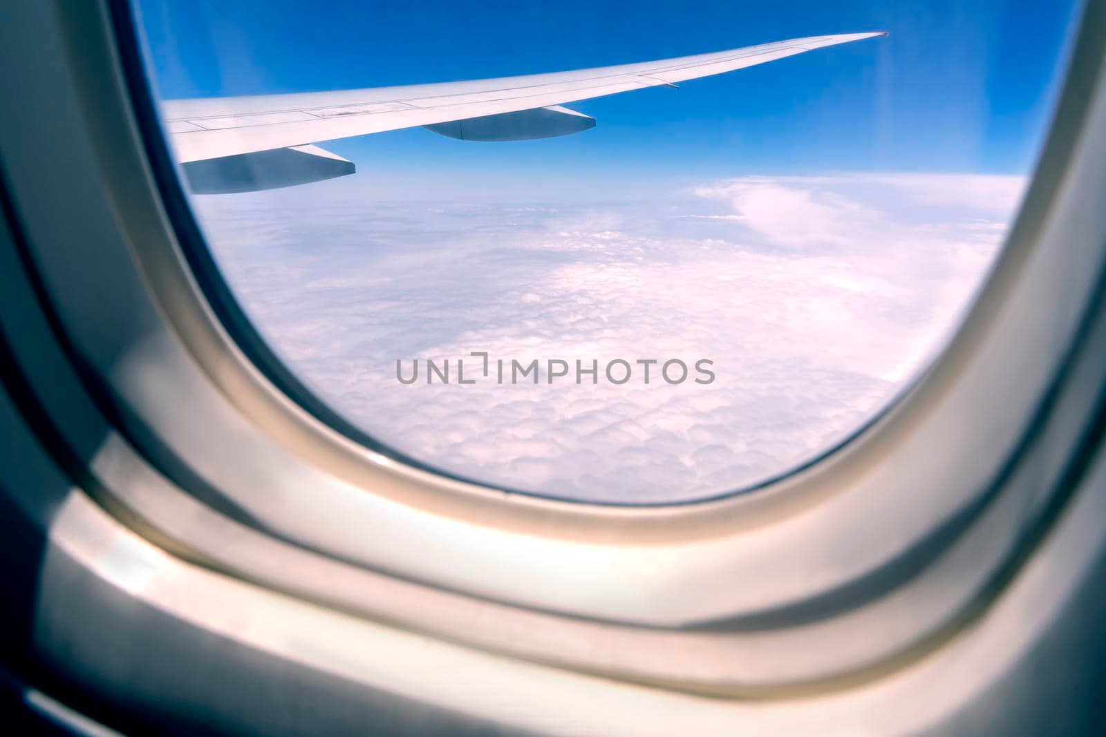Beautiful aerial view seen through window of flying aeroplane.