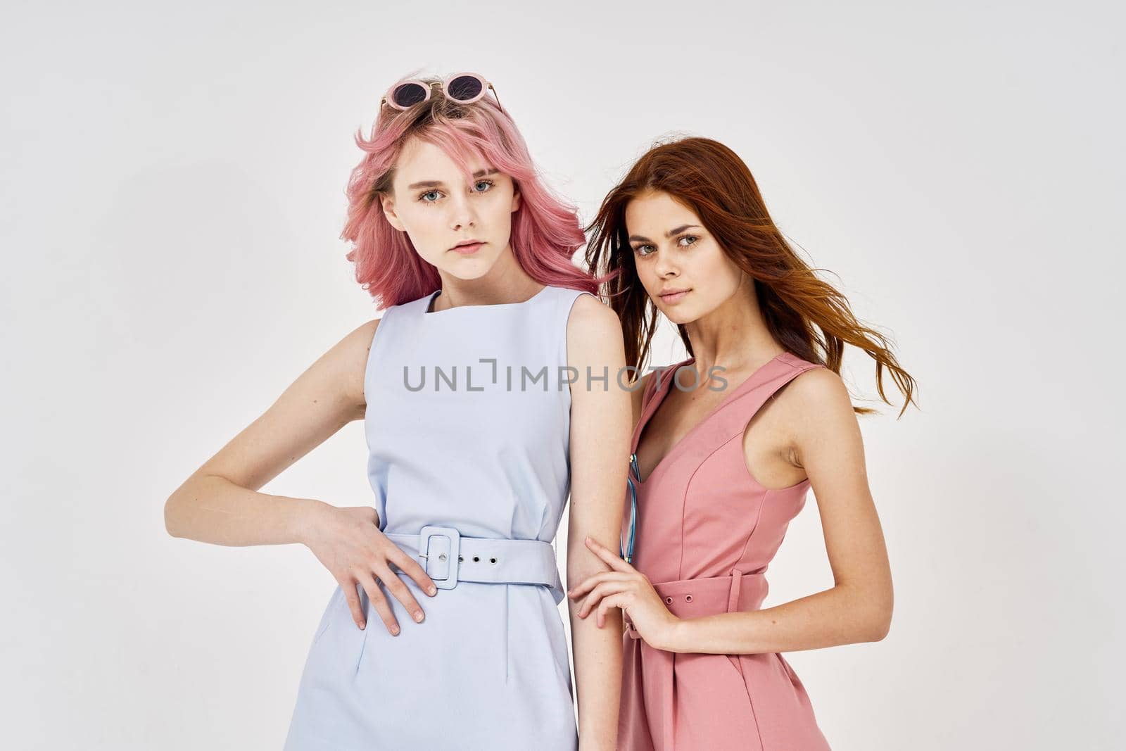 two fashionable girlfriends posing stylish clothes luxury models by Vichizh