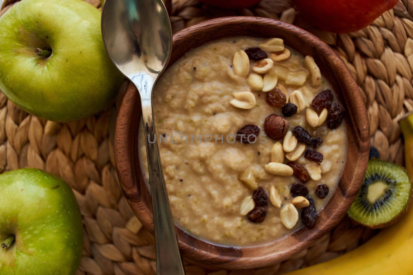 fruit dessert breakfast cereals vitamins organic wood background by Vichizh