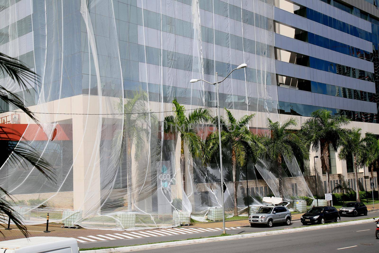 salvador, bahia, brazil - july 20, 2021: protection screen is seen in a building during the process of renovation of the facade in the city of Salvador.