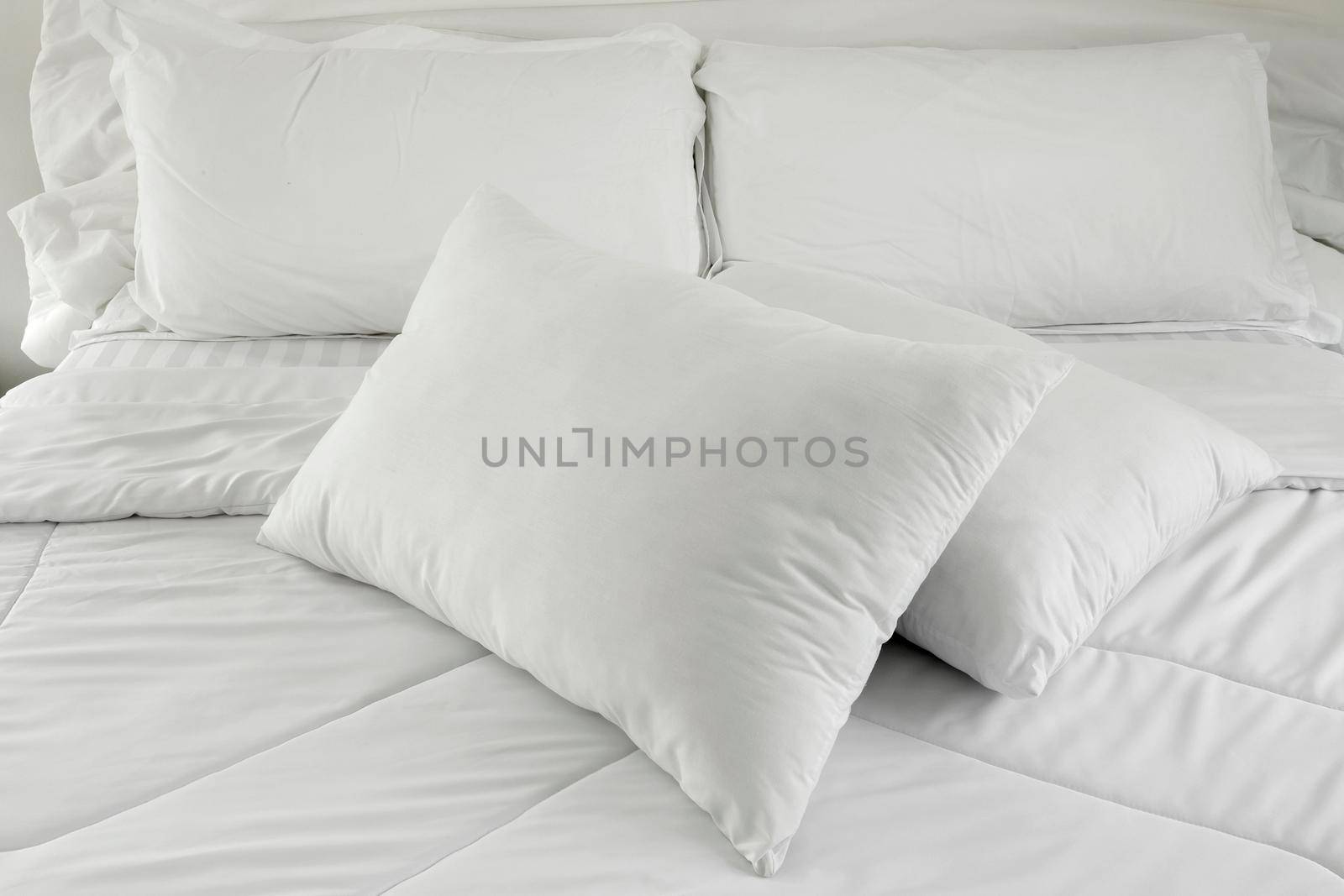 White pillows on a bed Comfortable soft pillows on the bed