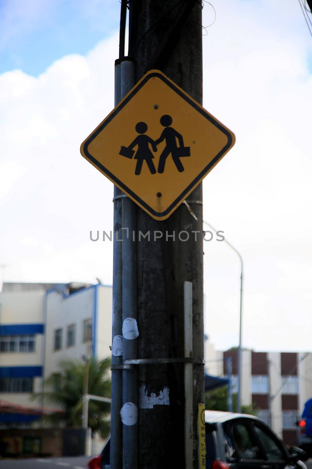 salvador, bahia, brazil - july 20, 2021: traffic sign indicating pedestrian crossing in a school area in the city of Salvador.