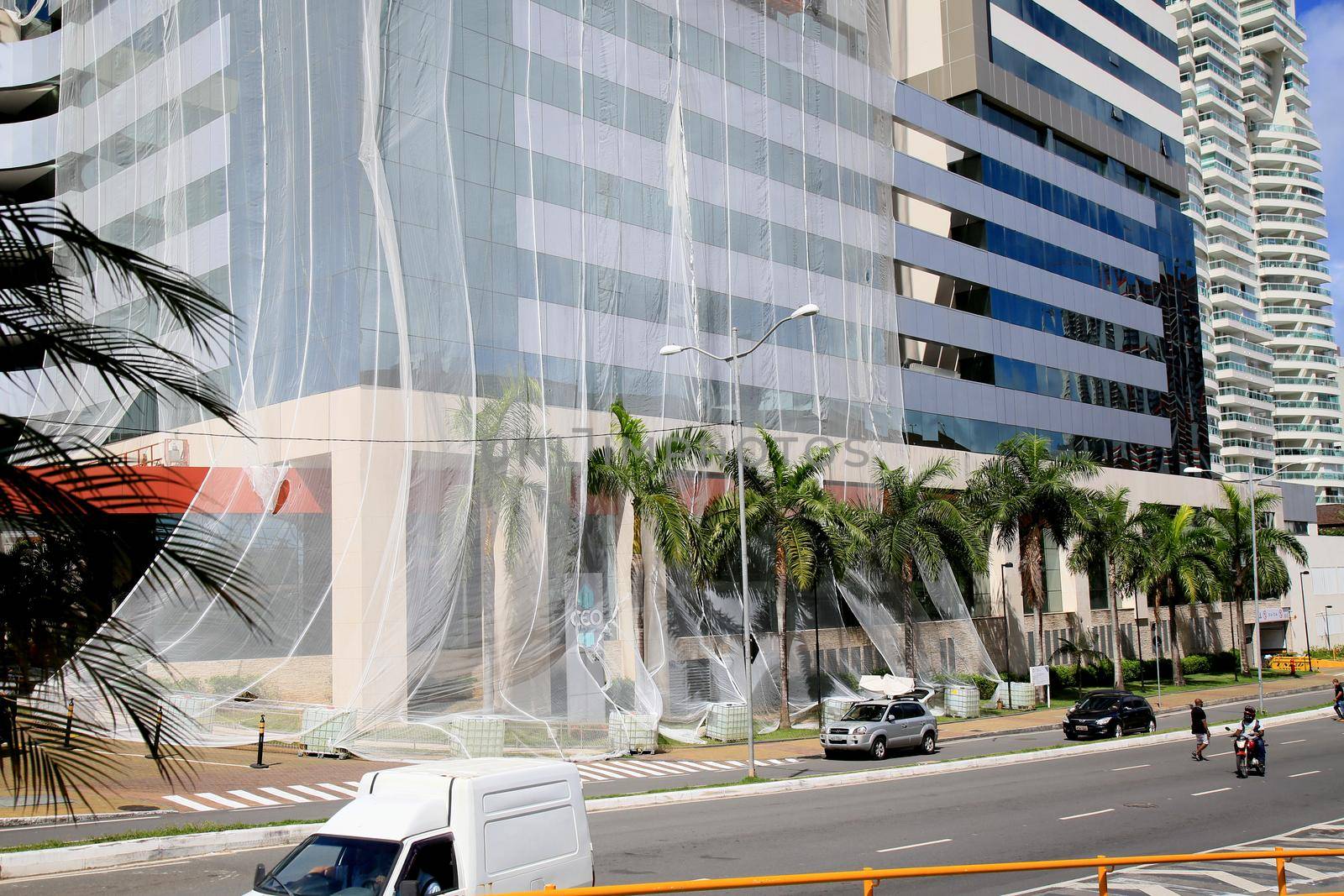 salvador, bahia, brazil - july 20, 2021: protection screen is seen in a building during the process of renovation of the facade in the city of Salvador.