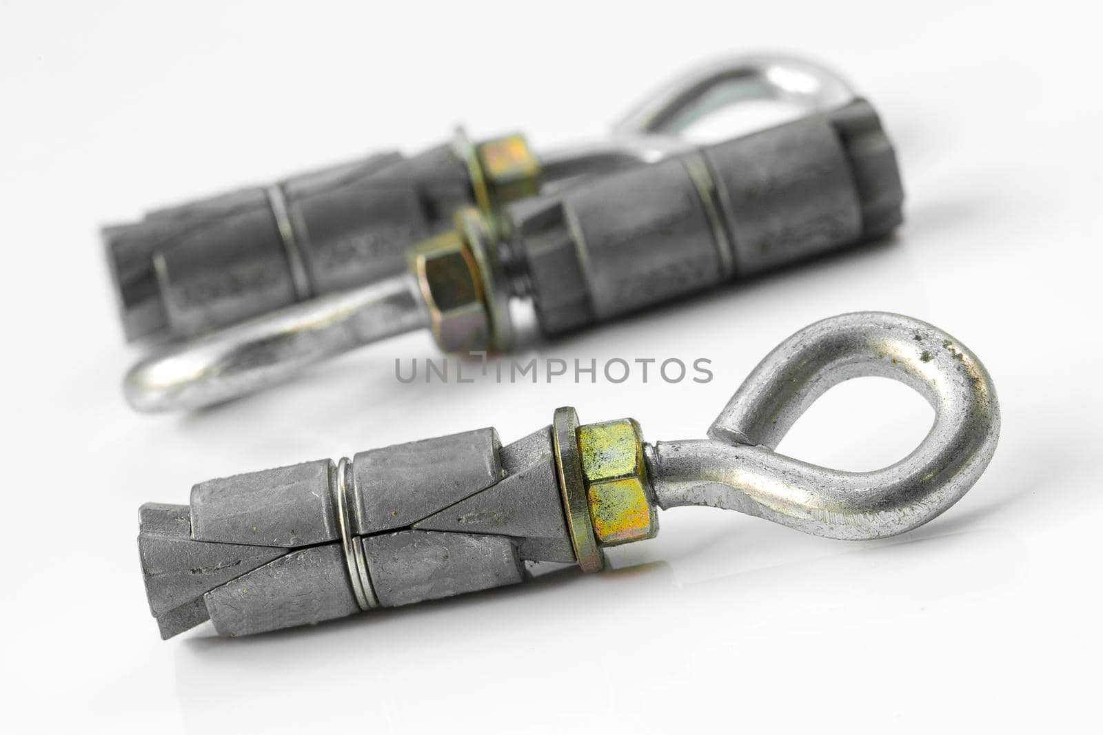 Anchor bolts, steel tools for construction on a white background