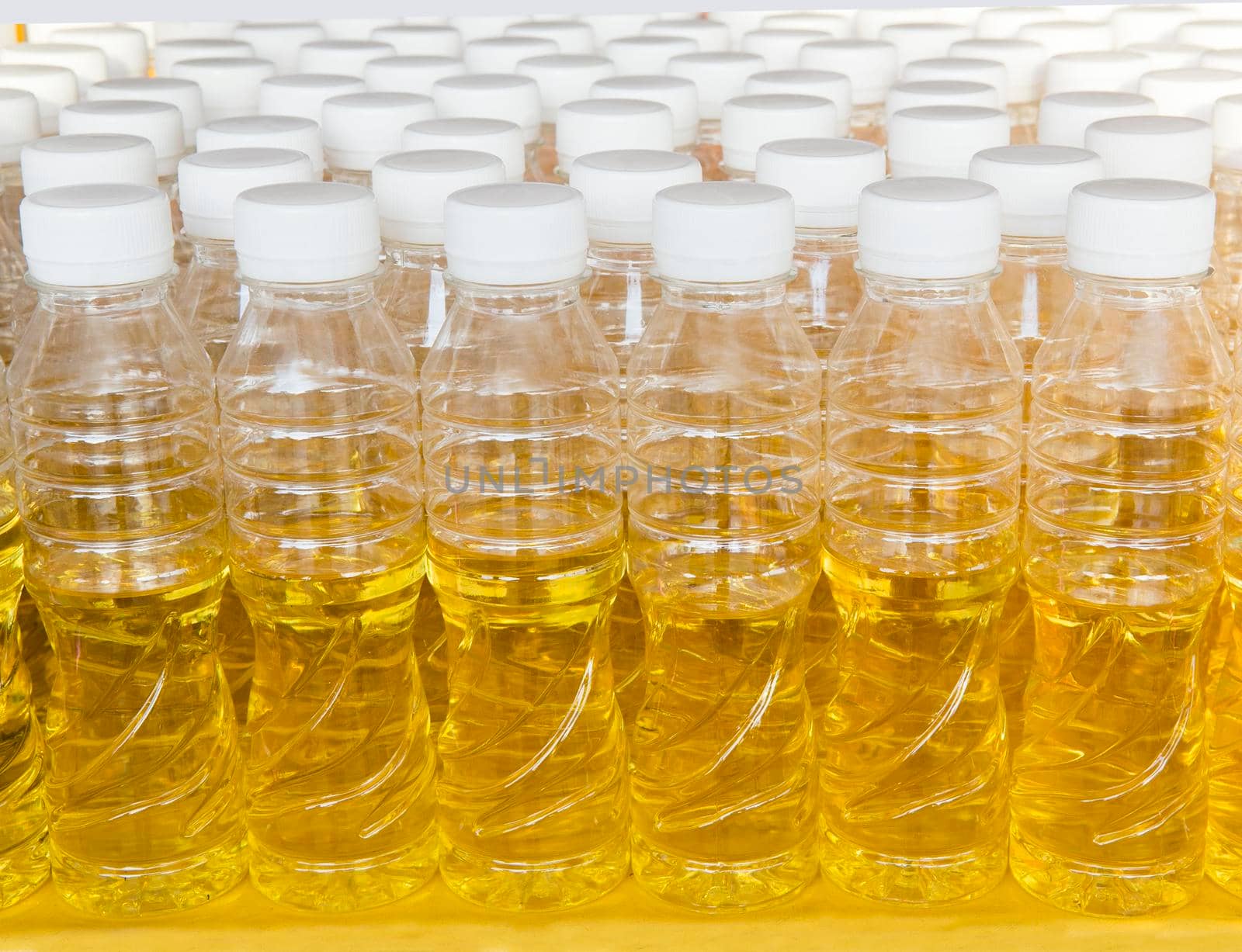 Oil bottle in factory by titipong
