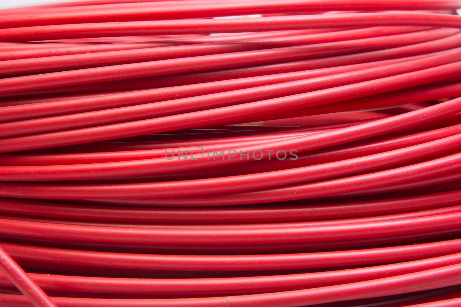 Red cable on a white background