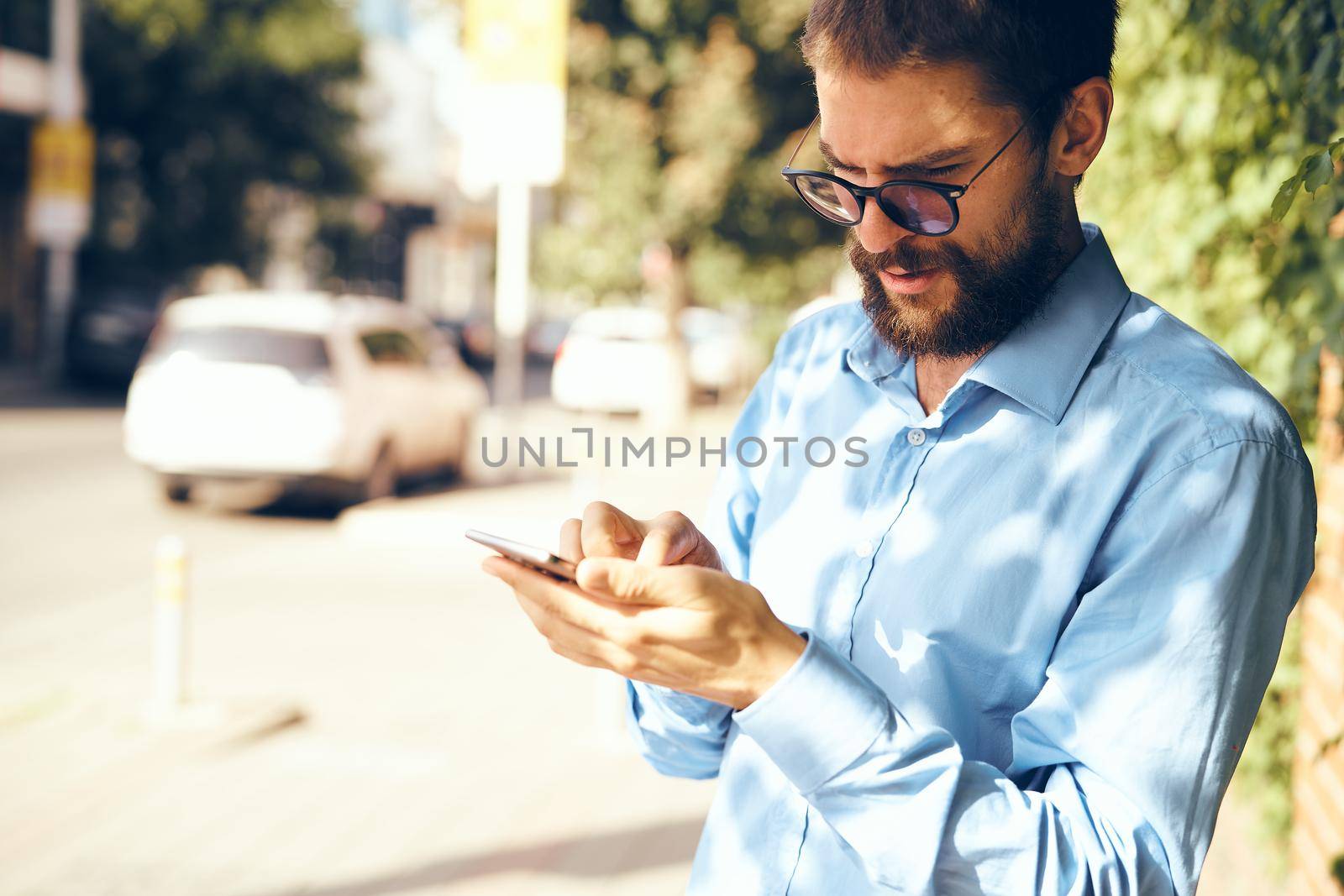 business man with phone outdoors communication lifestyle. High quality photo
