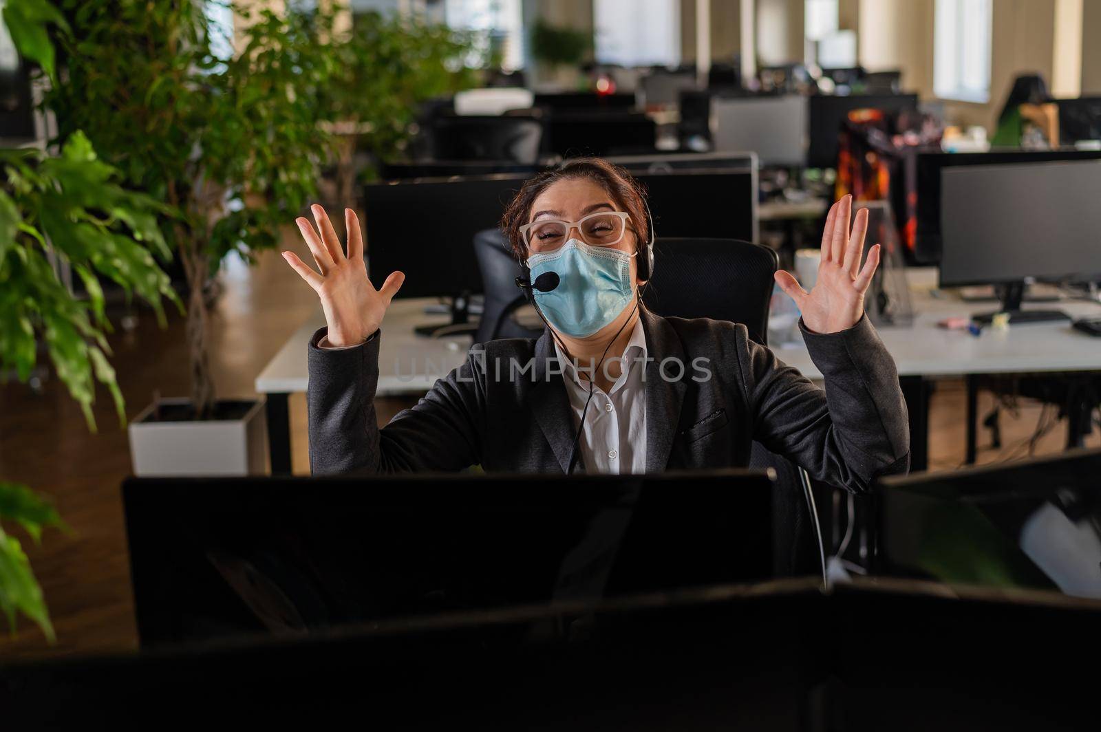 Business woman in protective mask screams in panic
