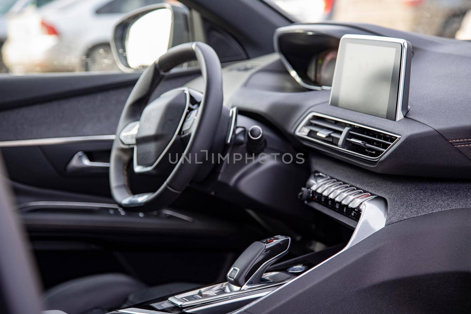 Dark luxury car interior. Black leather multifunctional steering wheel, start and stop engine buttom, dashboard, steering wheel and driver seat by Mariaprovector