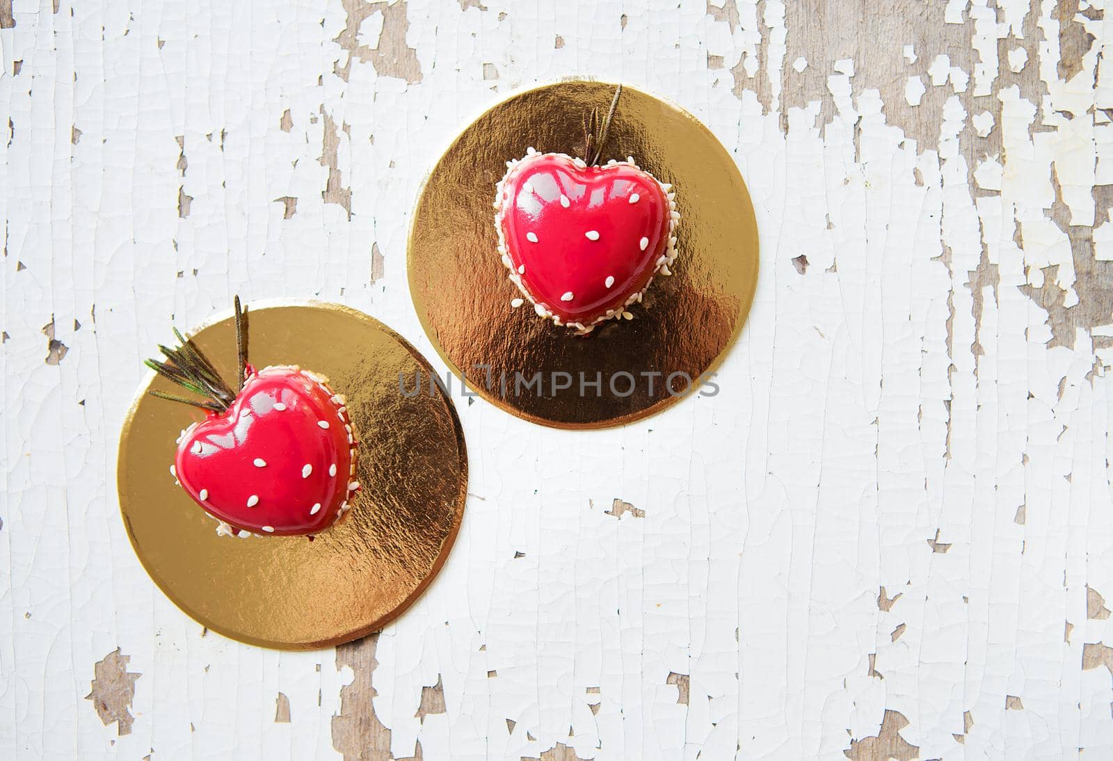 Beautiful and tasty dessert in the form of heart on an old wooden background. valentine card