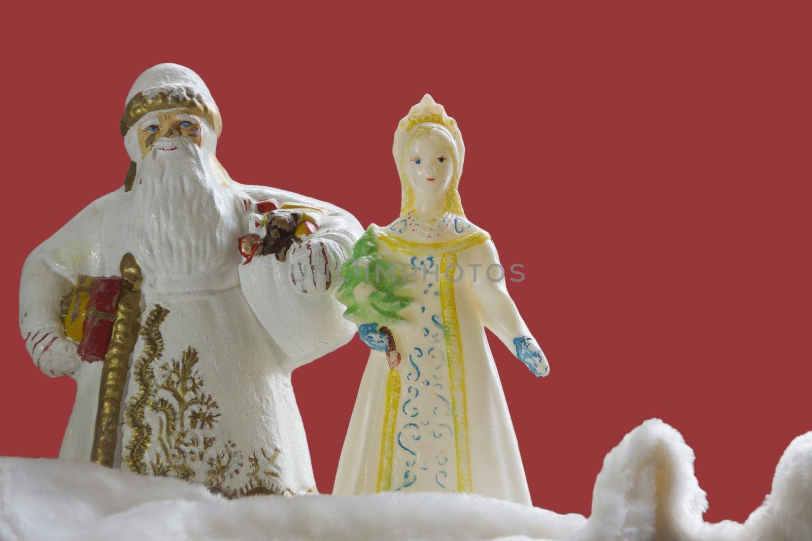 Traditional symbols of the Russian New Year are Santa Claus and Snow Maiden. Vintage Christmas toys. The atmosphere of childhood, New Year's miracles.