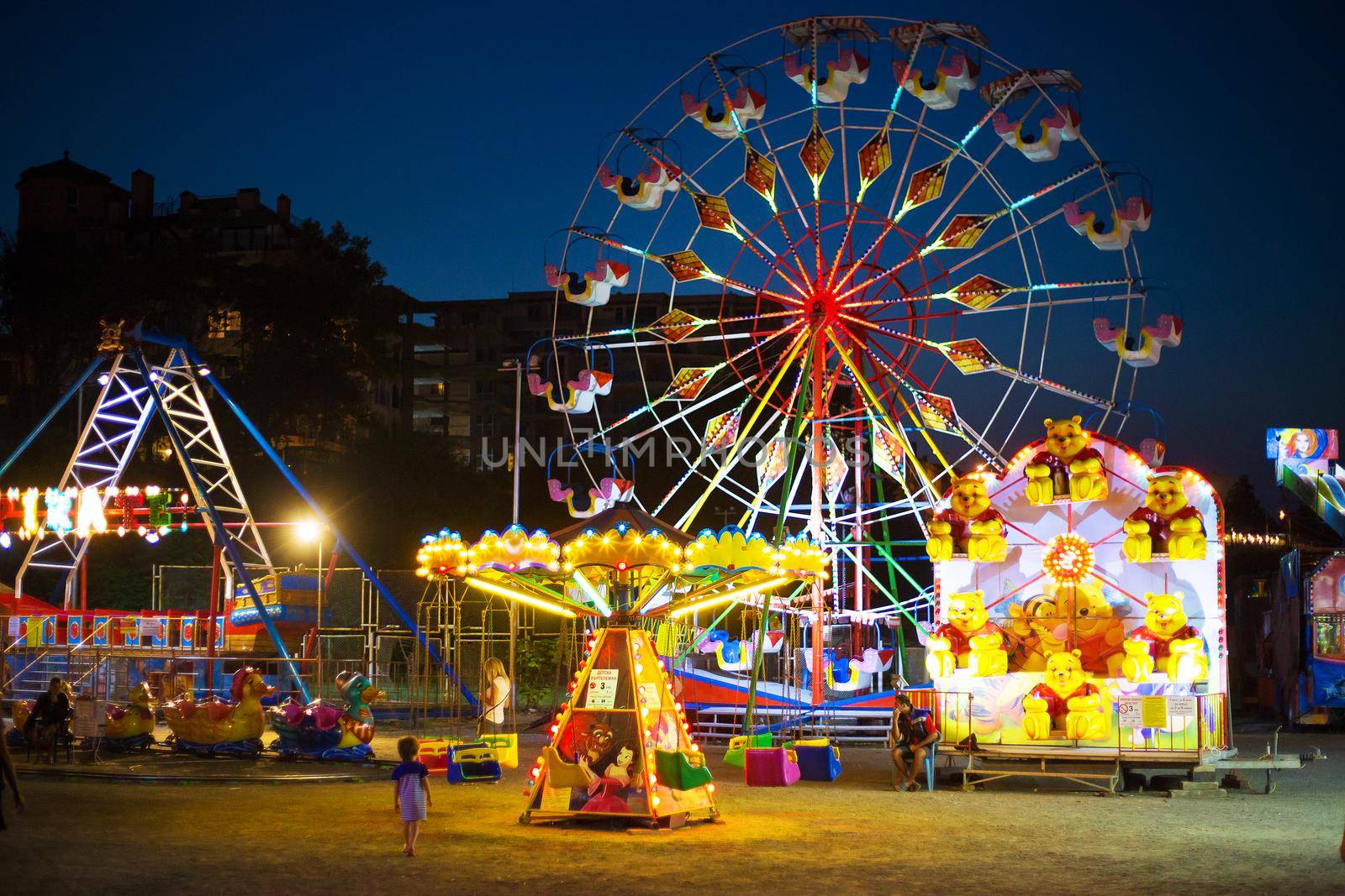 Night carousels in the summer in the old town of Nessebar Bulgaria.