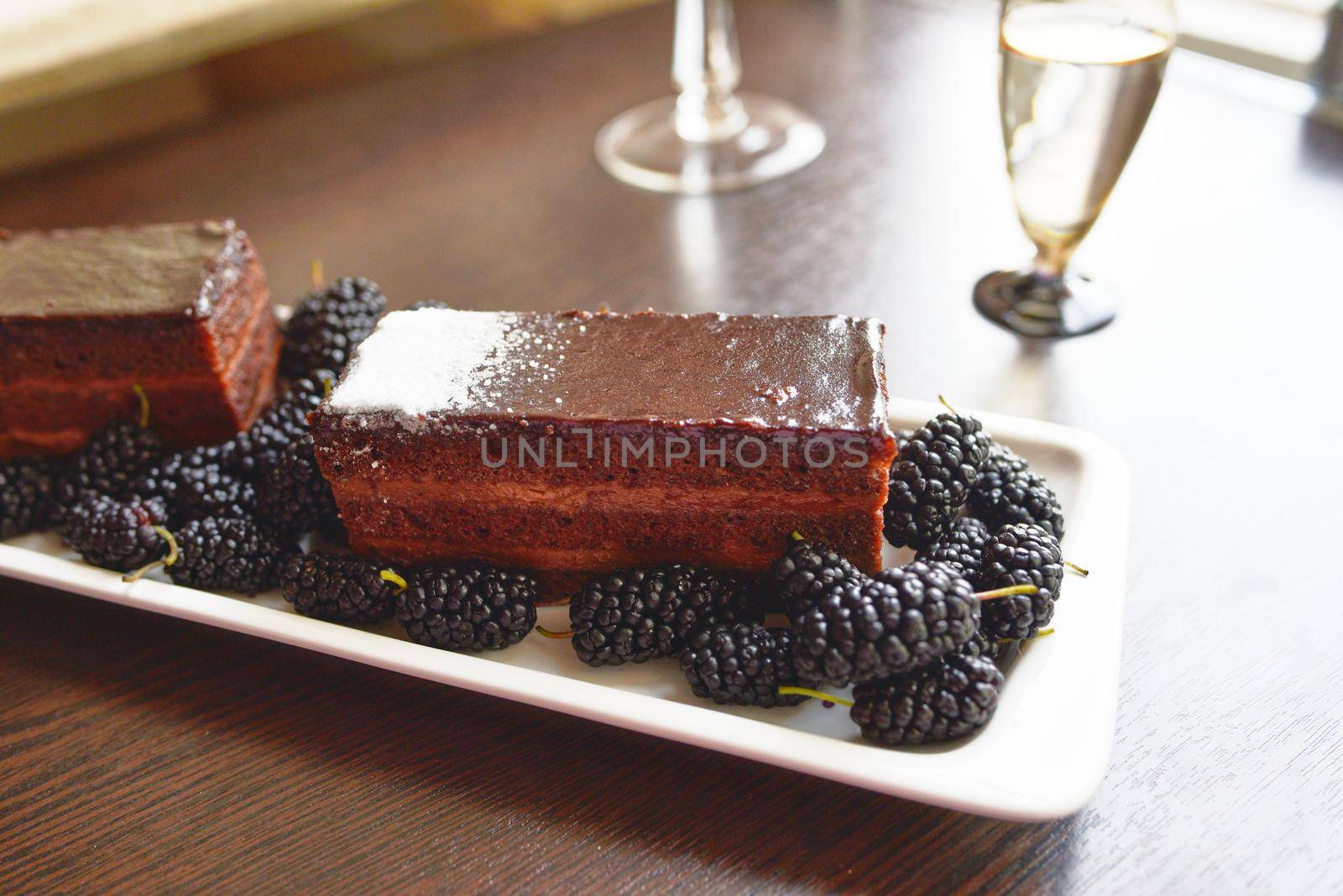 Mulberry chocolate cake. Selective focus