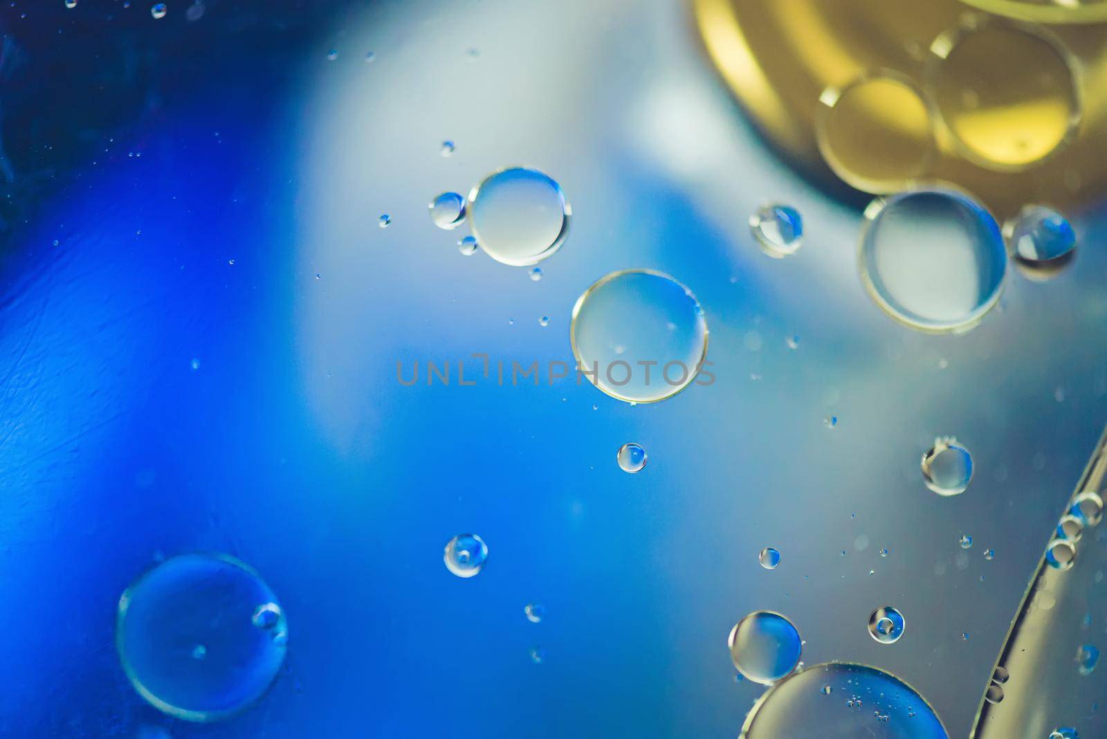 Oil drops in water. Abstract psychedelic pattern image multicolored. Abstract background with colorful gradient colors. DOF
