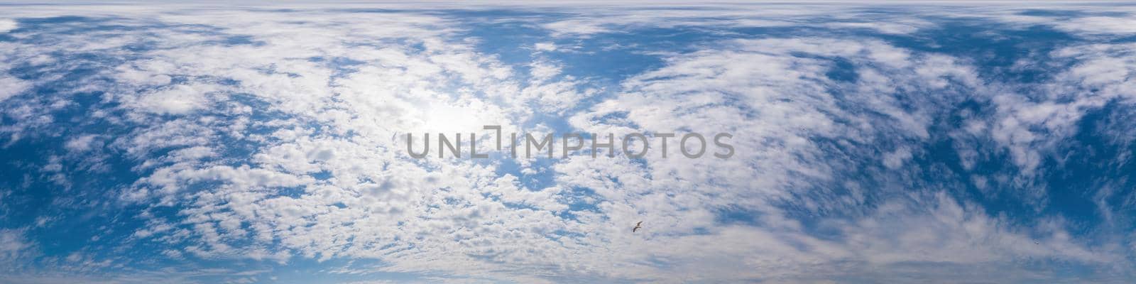 Sky panorama with Cirrus clouds in Seamless spherical equirectangular format. Full zenith for use in 3D graphics, game and editing aerial drone 360 degree panoramas for sky replacement