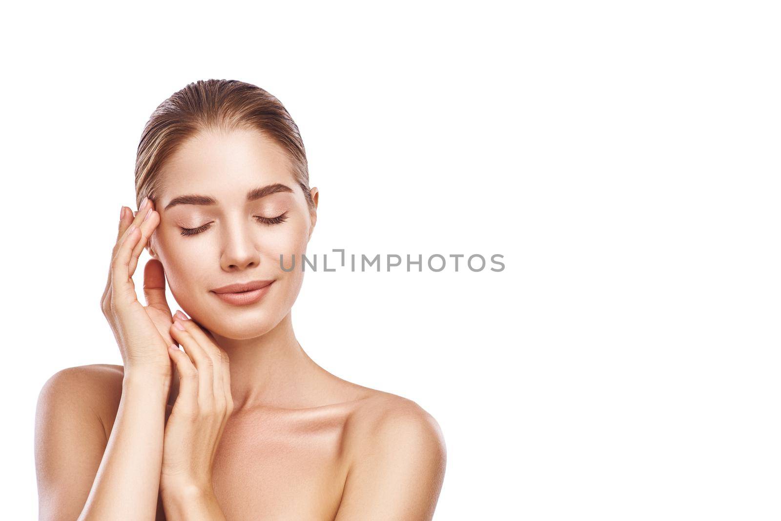 Beautiful woman face close up studio photo on white background. Light hair, grey eyes, closed eyes