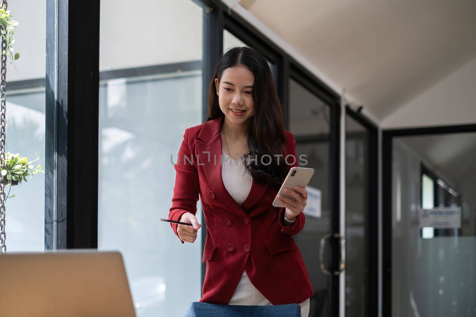 Online video conference and Digital meeting. Business woman discussing business with team by video conference in home office by itchaznong