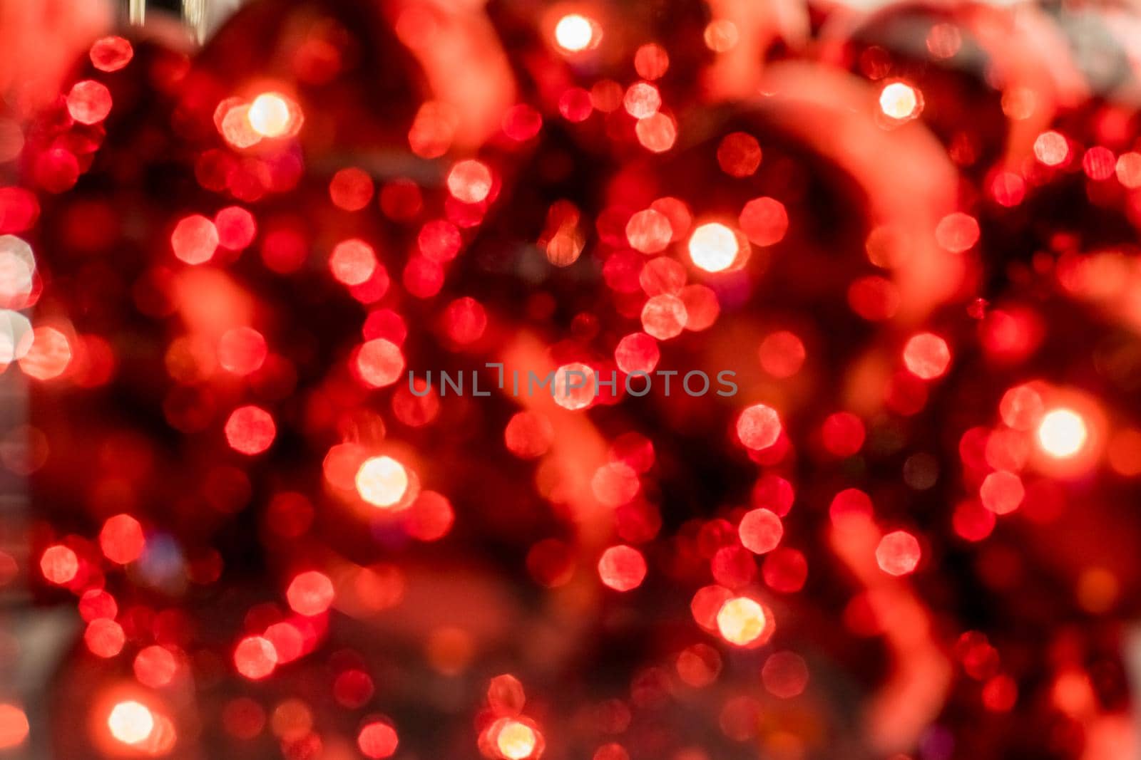 Abstract defocused blurred background. Festive background.red and white bokeh , christmas and happy new year banner. ad or postcard by YuliaYaspe1979