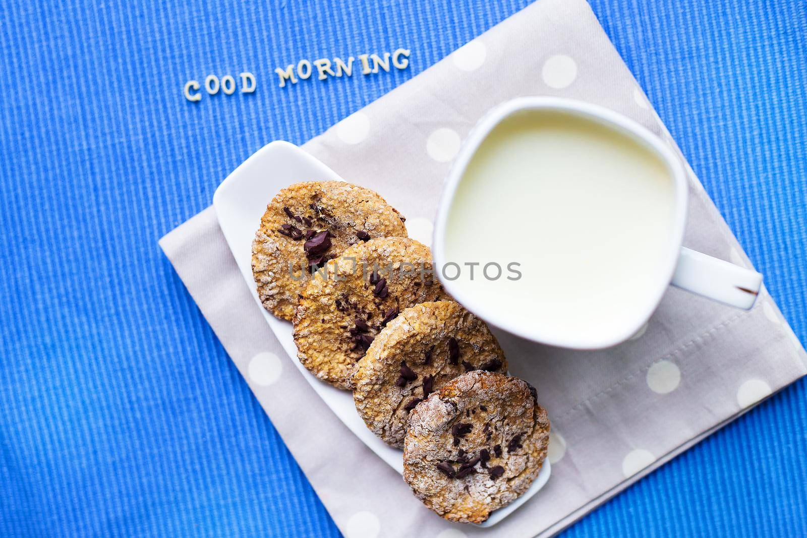 oatmeal cookies in a white plate with a cup of milk that says good morning by sfinks