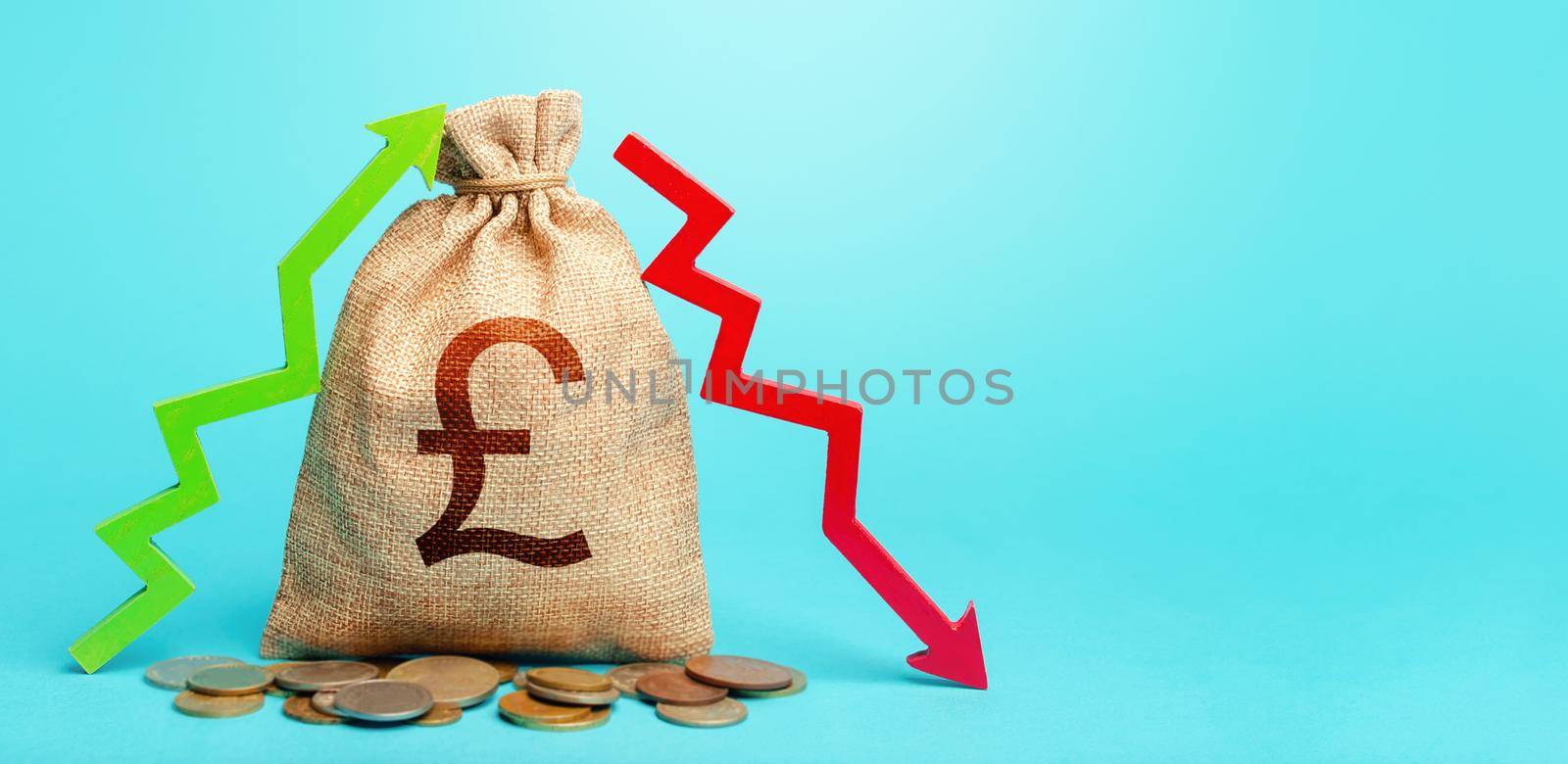 British pound sterling money bag and two arrows of profit loss. Income expense. Budget implementation. Debit and credit. Financial flows. Capital movement. Trade balance. Deposits or lending in banks.