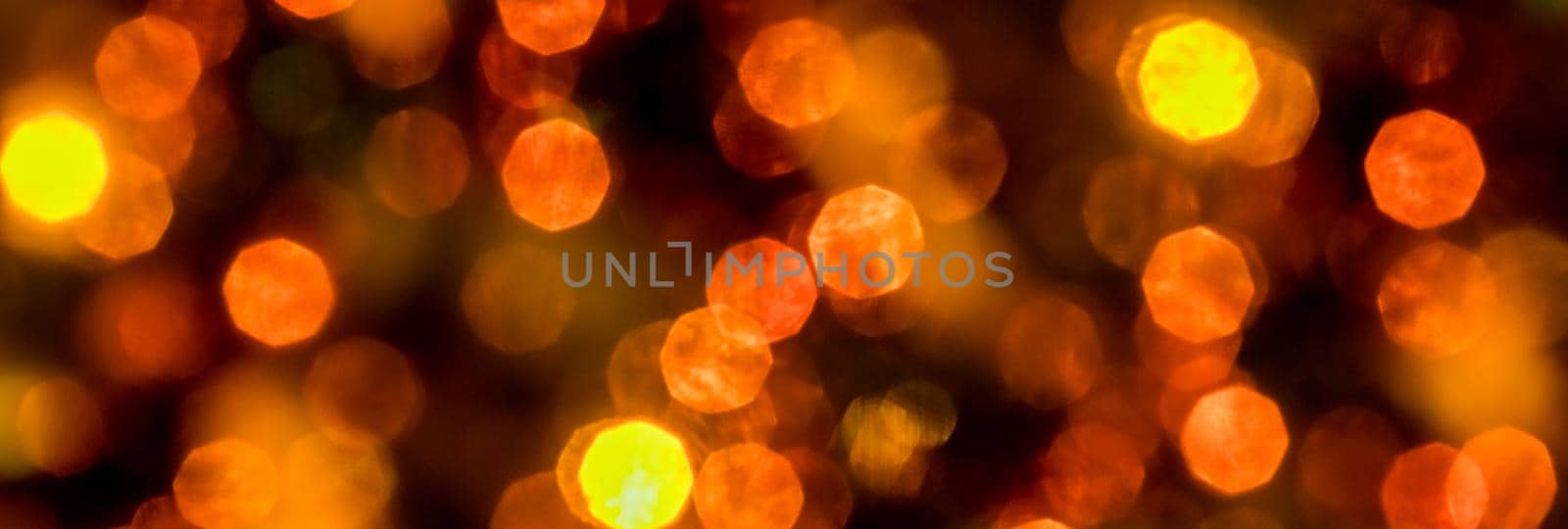 yellow and orange holiday bokeh. Abstract Christmas background.Christmas and New Year holidays background. Blurred Bokeh.Web banner by YuliaYaspe1979